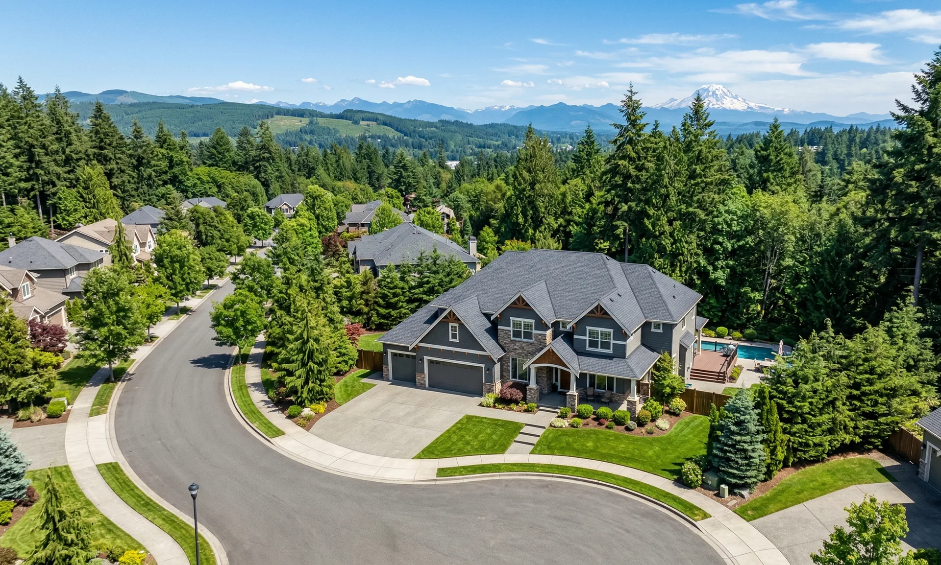 Pacific Northwest neighborhood with quality shingle roofs and Mt. Rainier
