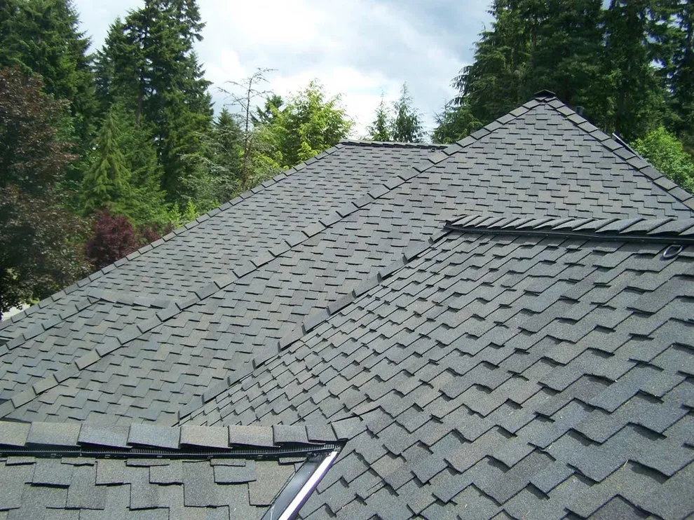 Gray architectural shingle roof with multiple peaks